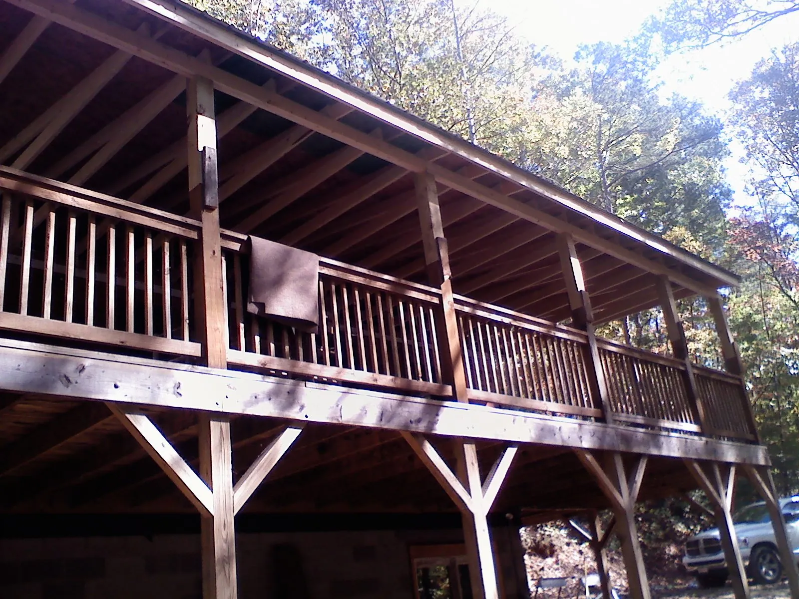 Timber framing under a new elevated porch and deck — Roof Leak Repair in La Rose by Roofing Brothers
